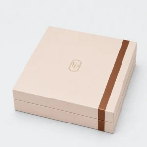 Custom Brown Paper Hinged Jewelry Box with Ribbon Bow logo and closure detail