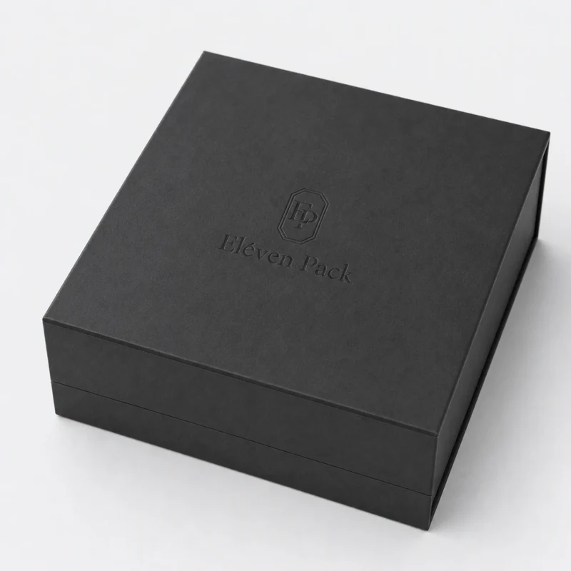 Debossed ElevenPack logo and magnetic lid seam on a black gift box Debossed ElevenPack logo and magnetic lid seam on a black gift box