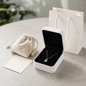 Custom White Art Paper Flip Top Necklace Box - coordinated packaging system scene