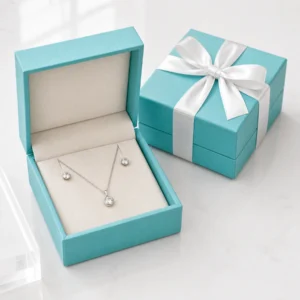 Custom Luxury Tiffany Blue Hinged Cardboard Jewelry Box - in-use jewelry presentation scene