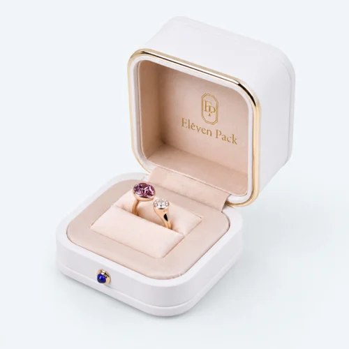 Custom Luxury White PU Leather Hinged Ring Box - open product presentation with jewelry