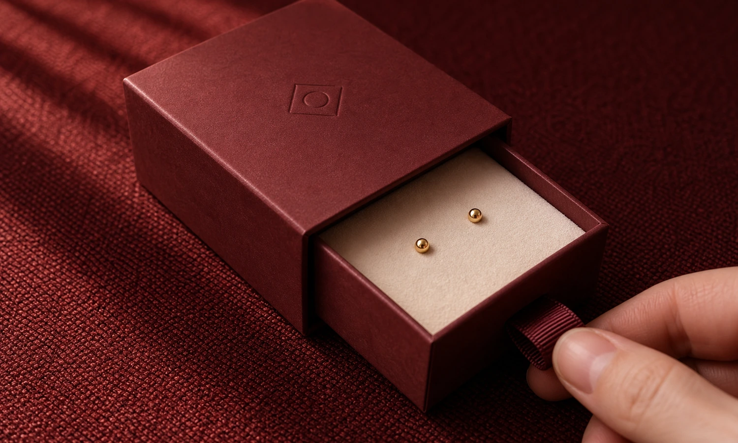 A jewelry presentation box opening naturally while the jewelry stays centered in its insert.