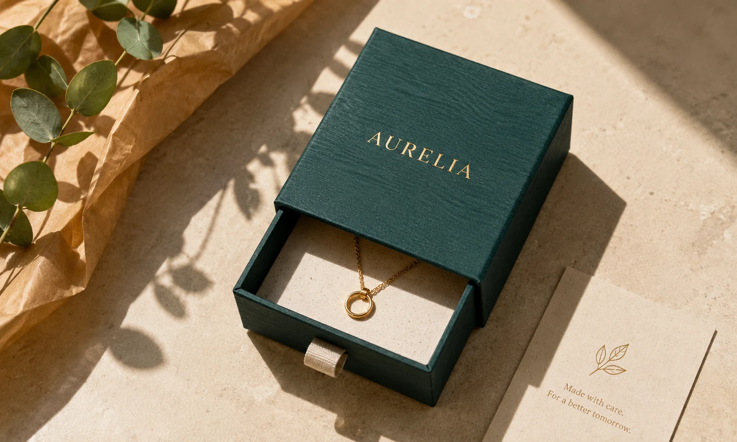 Minimal sustainable jewelry package with a right-sized box and cotton pouch