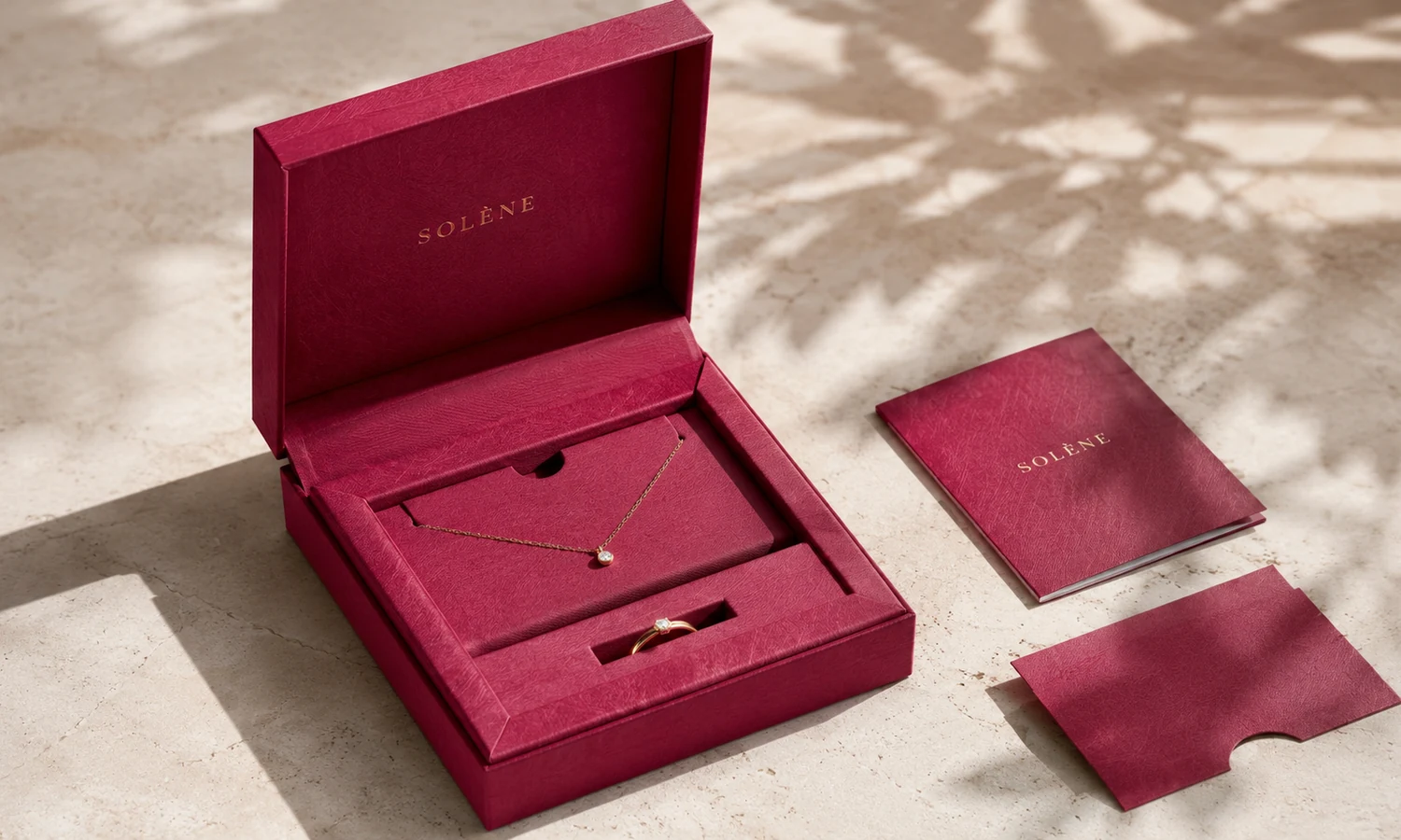 Open right-sized recycled jewelry box with one cotton pouch inside