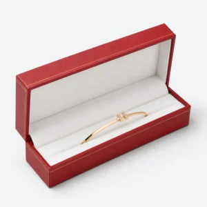 Open custom red leather hinged bangle box with a fitted white channel