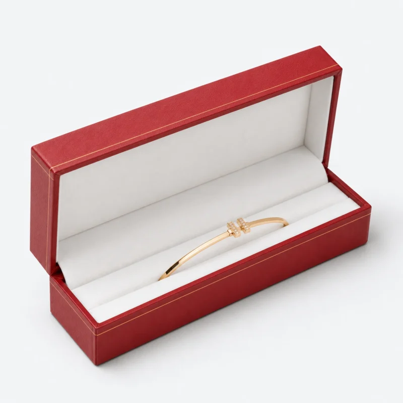 Open custom red leather hinged bangle box with a fitted white channel