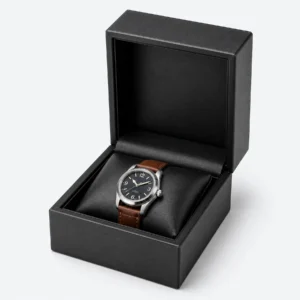 Open custom black genuine leather watch box with a fitted black pillow