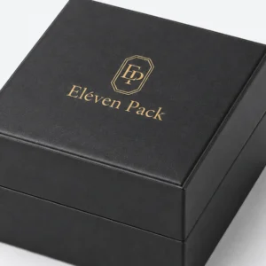 Black genuine leather watch box detail showing aligned lid and base seams
