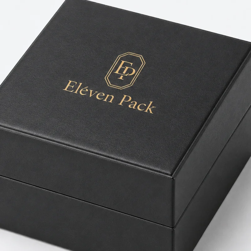 Black genuine leather watch box detail showing aligned lid and base seams