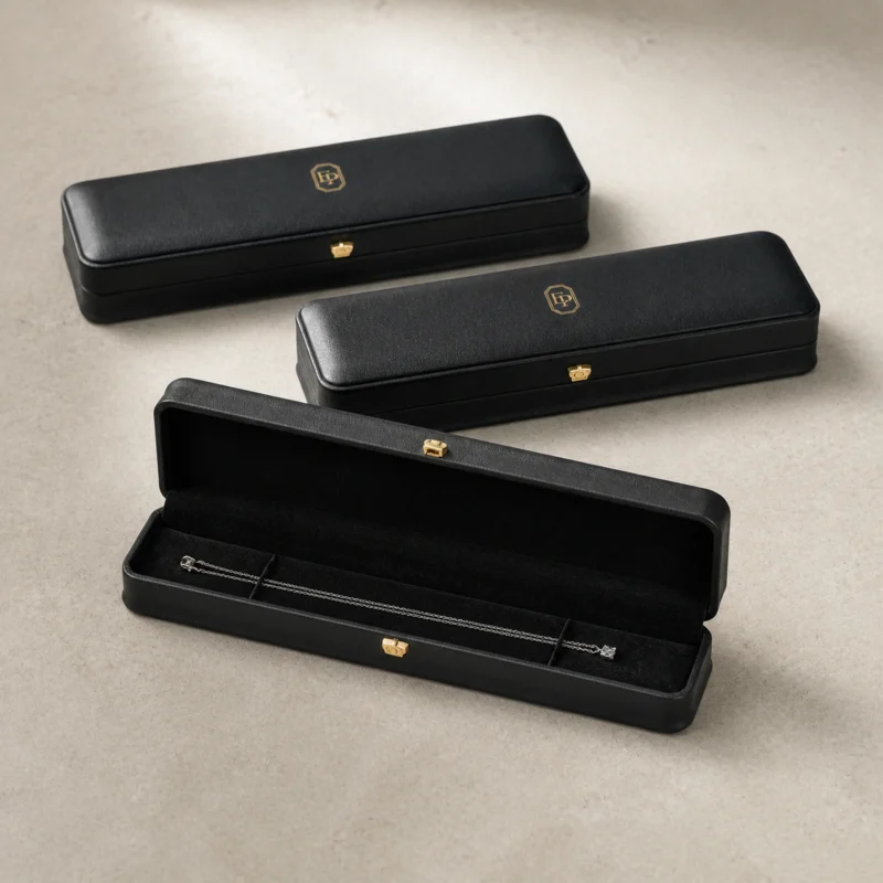Coordinated long black leather necklace box packaging system Coordinated long black leather necklace box packaging system