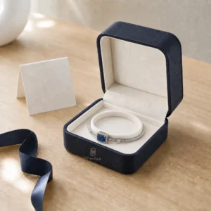 Custom dark blue bangle box in a light oak gift display scene