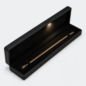 Open custom black leather LED bracelet box with a fitted long insert