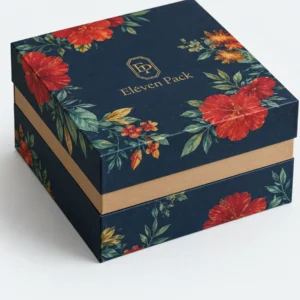 Close-up of the gold band and lid-base seam on a floral gift box