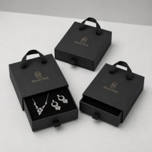 Three black drawer jewelry boxes in a wholesale packaging assortment