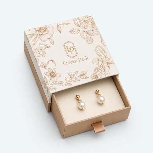 Open floral cardboard drawer earring box with pearl drop earrings