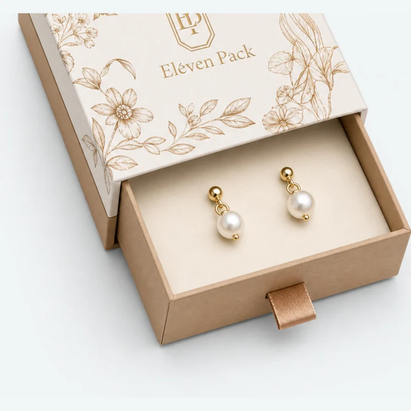 Close-up of pearl earrings in the fitted drawer insert