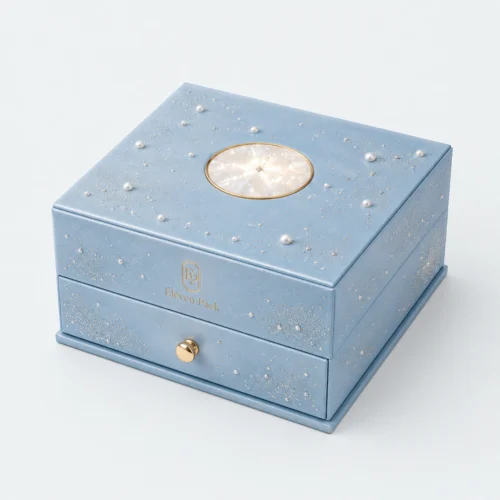 Closed blue cardboard jewelry organizer with pearl star decoration