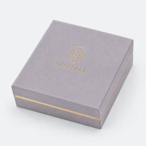 custom velvet fabric hinged jewelry box image 02 closed JB-BM-02-P4 Closed lavender fabric hinged jewelry box with gold logo and perimeter band