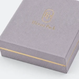 custom velvet fabric hinged jewelry box image 04 gold band finish JB-BM-02-P4 Close-up of lavender fabric grain, gold band and wrapped lid edge