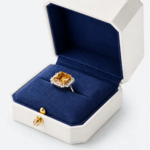 Close-up of navy velvet ring rolls and gemstone ring seating seam