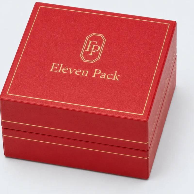 Gold ElevenPack logo and fine border finish on a square red leather ring box lid
