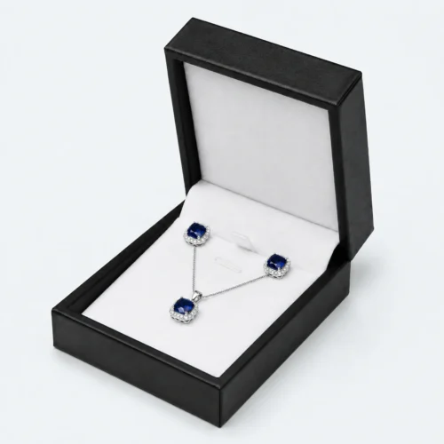 custom black pu leather necklace box image 01 main open JB-BM-05-P24 Open black PU leather necklace box with white fitted insert and blue jewelry set