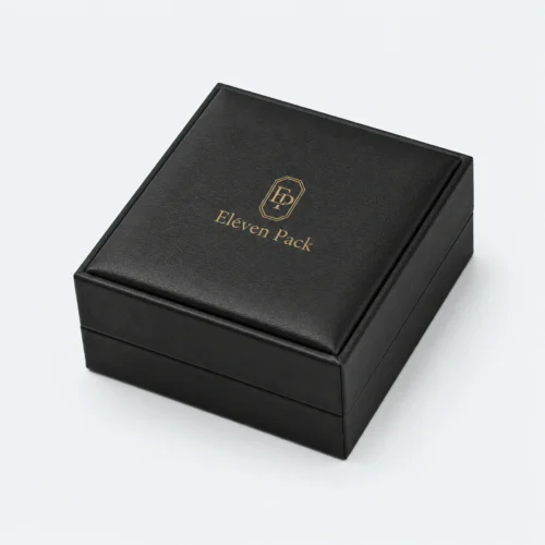 Closed black PU leather necklace box with gold ElevenPack logo on the lid top