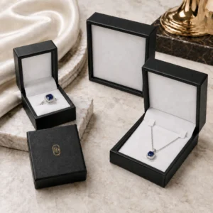 custom black pu leather necklace box image 06 system scene JB-BM-05-P24 Black PU leather jewelry packaging family with blank open lid edges and branded closed lids