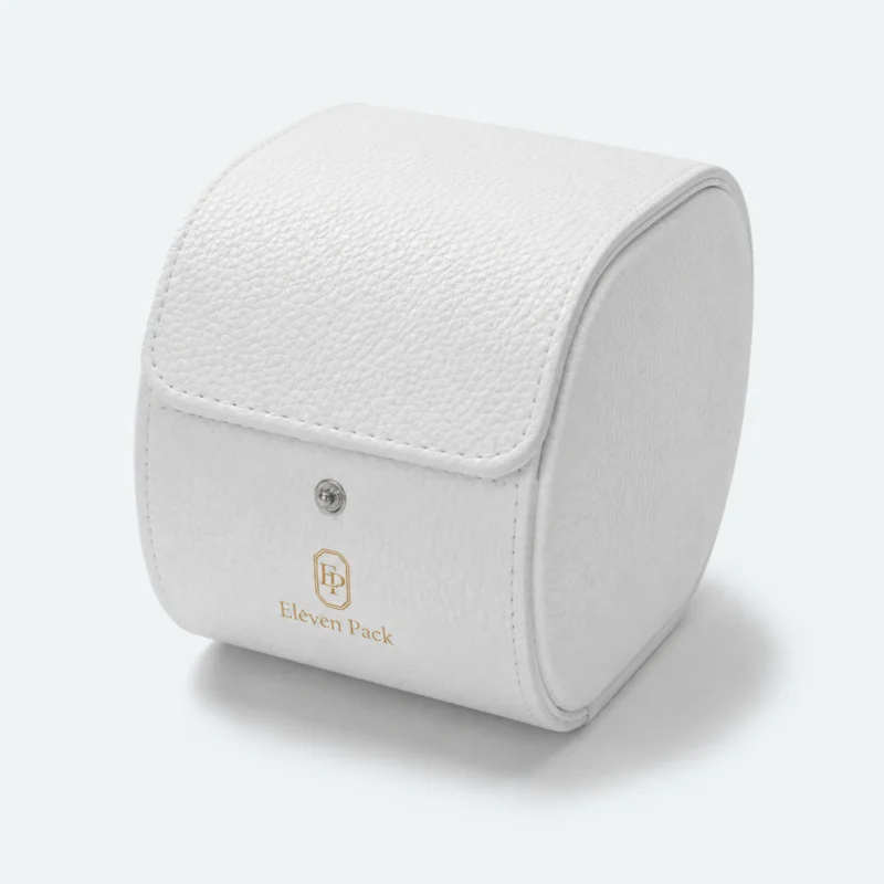 Closed white leather watch box with rounded profile and gold logo