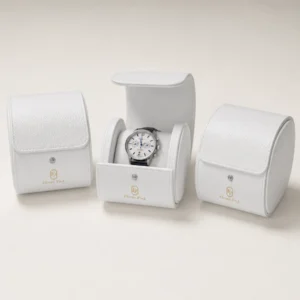 Coordinated white leather watch boxes shown open and closed
