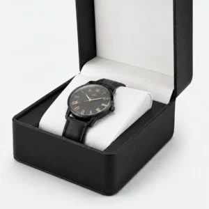 Close-up of the watch cushion and fitted interior in a black leather box