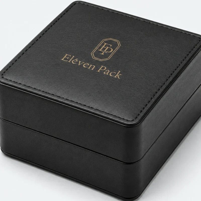 Black genuine leather watch box detail with stitching and gold foil branding