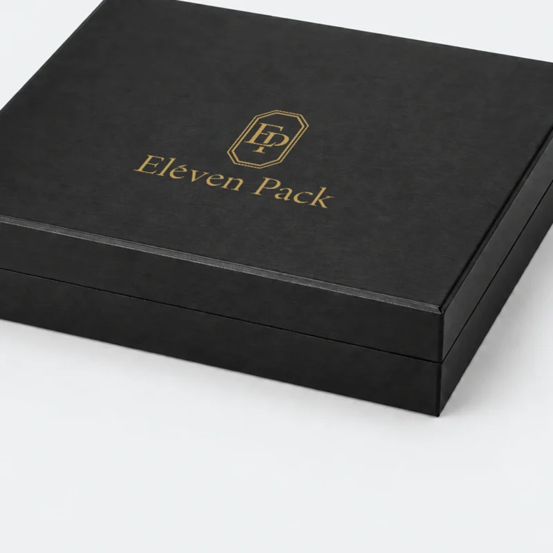 Gold ElevenPack logo detail on the textured black outer lid