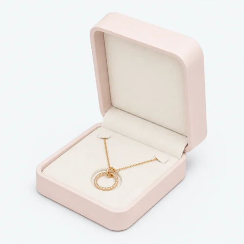 Custom Dusty Pink Leather Necklace Box Image 01 Main Open - JB-BM-03-P25 Open dusty pink genuine leather necklace box with supported gold pendant