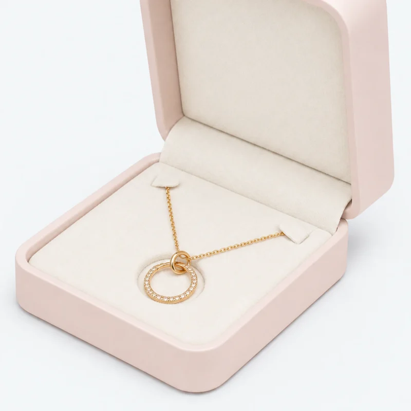 Dusty pink necklace box insert showing two chain tabs and pendant support