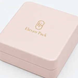 Close-up of dusty pink leather finish and gold foil branding