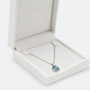White necklace box insert showing two chain tabs and centered pendant support