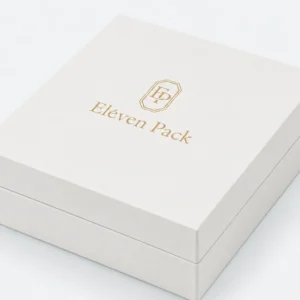 Close-up of white PU leather necklace box and gold foil branding