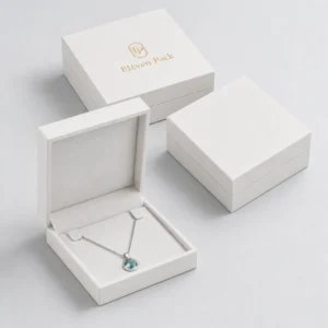 Coordinated white necklace packaging boxes shown open and closed
