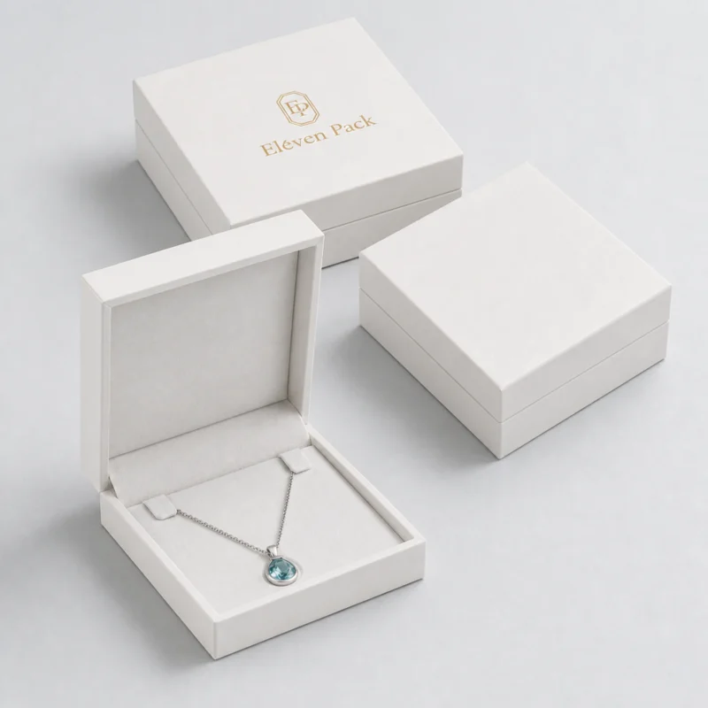 Coordinated white necklace packaging boxes shown open and closed