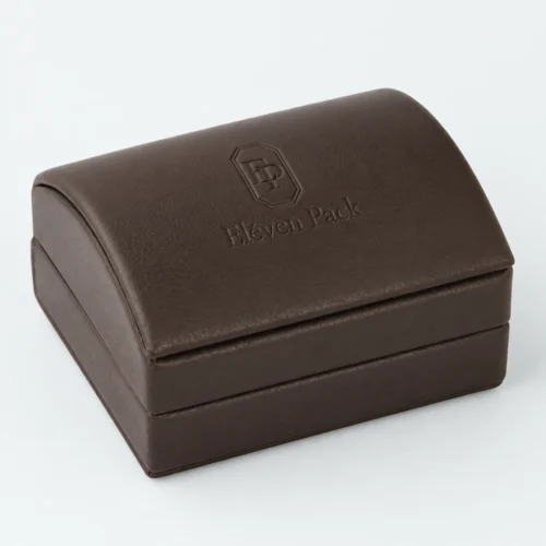 Closed brown genuine leather earring box in an angled product view