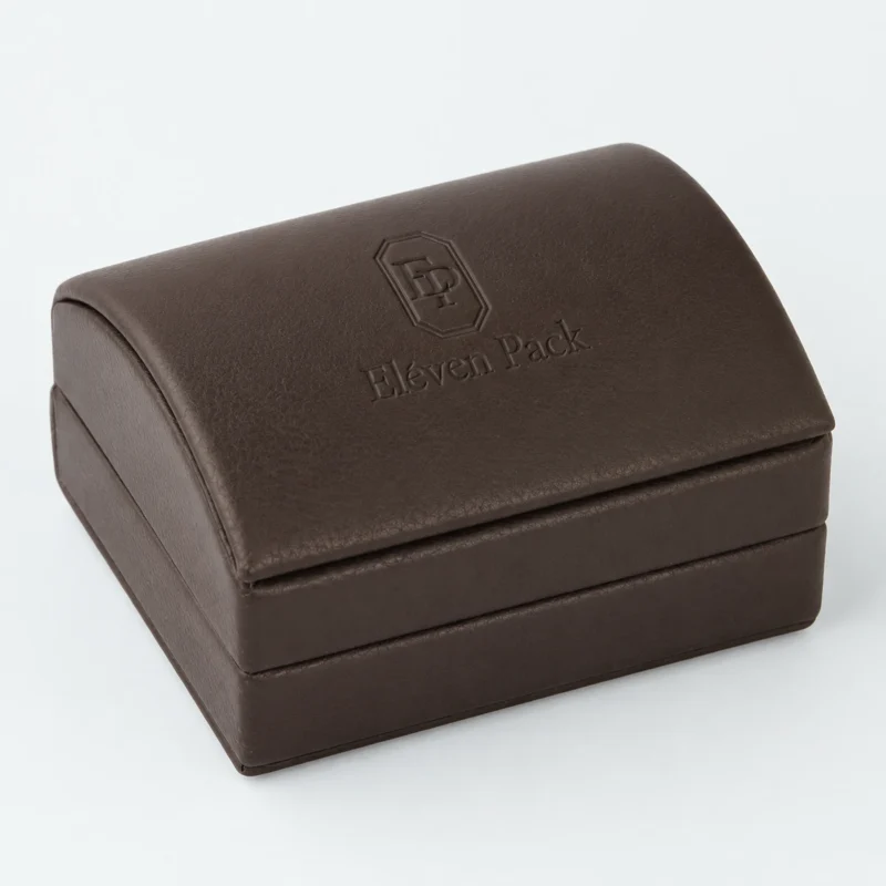 Closed brown genuine leather earring box in an angled product view