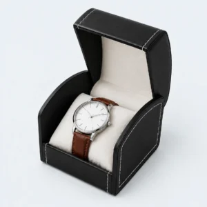 Open black genuine leather watch box with wristwatch displayed inside