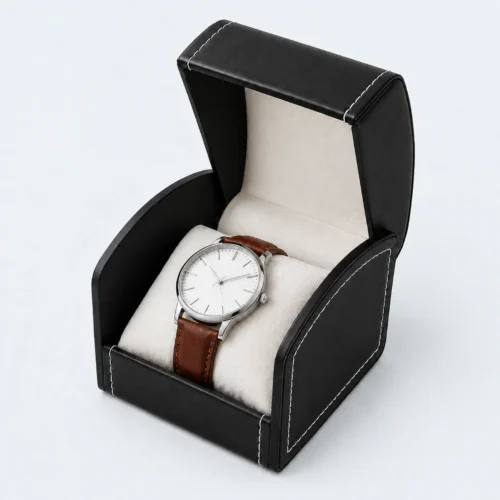 Open black genuine leather watch box with wristwatch displayed inside