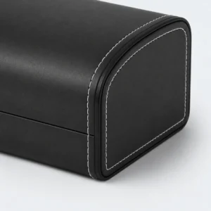 Black genuine leather watch box showing the stitched shell detail