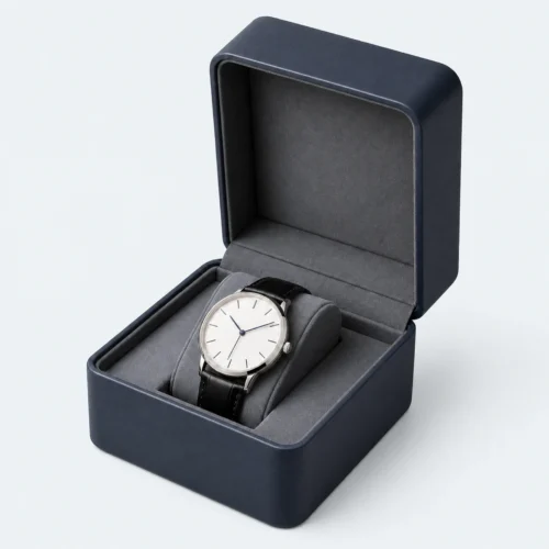 Open navy blue genuine leather watch box with wristwatch displayed inside