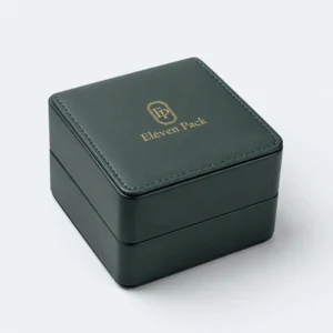 Closed green and beige genuine leather watch box in an angled product view