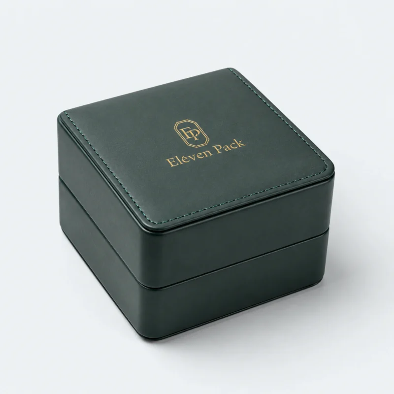Closed green and beige genuine leather watch box in an angled product view