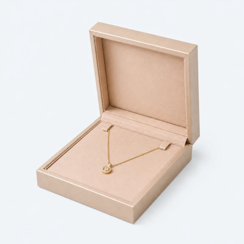 Open champagne PU leather necklace box with pendant necklace displayed inside