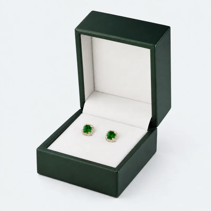 Dark Green PU Leather Earring Box - Main Open Open dark green PU leather earring box with green stud earrings displayed inside